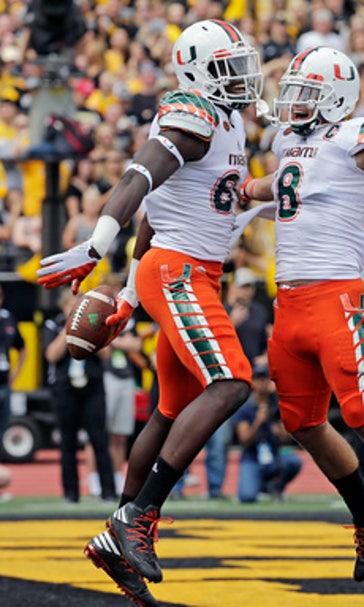 COLLEGE PICKS: Washington, Miami try to snap rivalry skids
